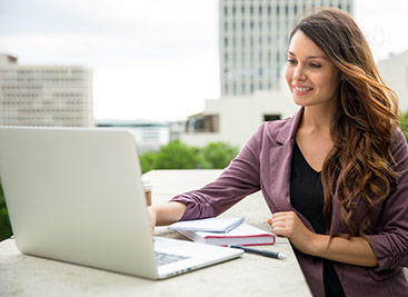 Researcher working on laptop